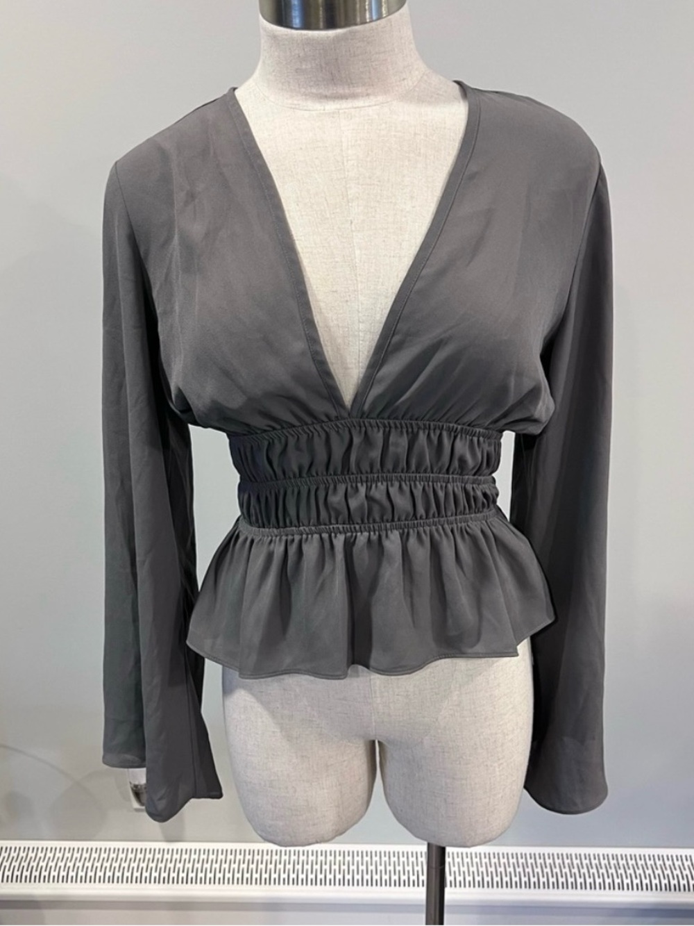 VENUS Charcoal Deep V Smocked Peplum Long Sleeve Top